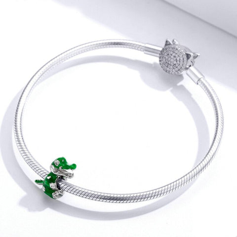 Adorable Green Dinosaur Charm for Pandora Bracelet - Sterling silver and green enamel dinosaur charm designed to fit Pandora bracelets, sparkling