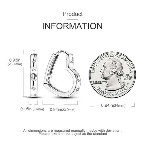 Sterling Silver Heart Hoop Earrings - Sterling silver heart-shaped hoop earrings with celestial star and moon details next to a quarter for size comparison.