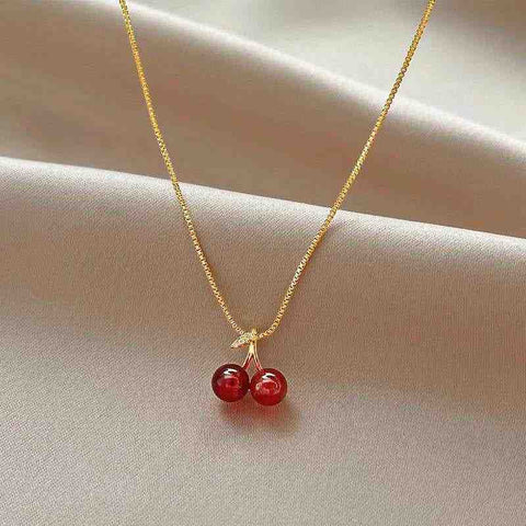 Cherry Gold Pendant Necklace - Sweet & Stylish - Chic Gold Chain Anklet - Adjustable Fishbone Design - a gold necklace with a red glass be
