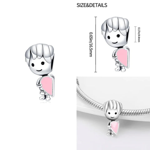 Sterling Silver Boy with Pink Heart Charm for Pandora Bracelets - Sterling silver boy charm holding a pink heart, fits with Pandora bracelets, detailed with dimensions.
