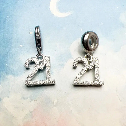 Sparkly silver ''' charms.