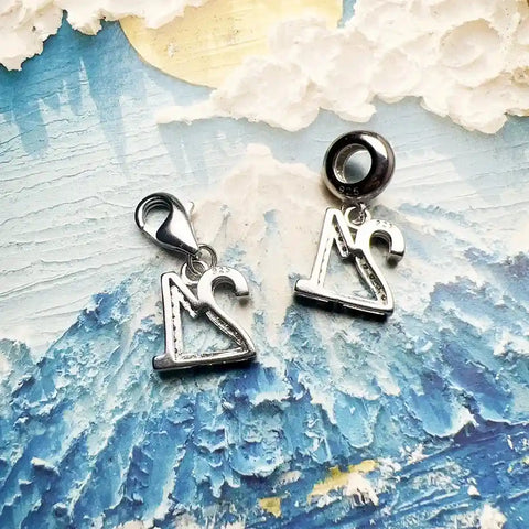 Silver letter charms.