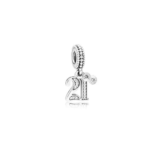 14k peace, love, and luck dangle charm, a symbolic addition for charm bracelets