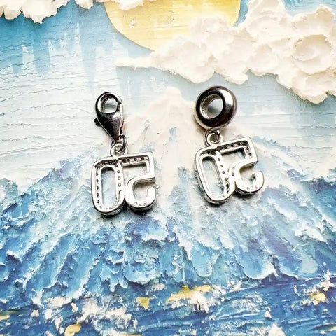 Silver number charms.