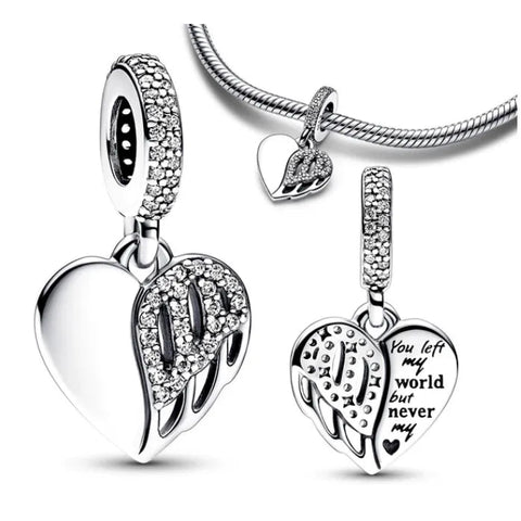 Silver heart-shaped pendant with engraved message on a white background