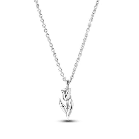 Sterling silver necklace featuring a delicate flower-shaped pendant, on an adjustable chain.