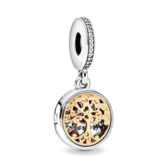 Sterling silver family tree charm with gold accents, crystal details, and "Forever" inscription.