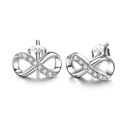 Infinity symbol stud earrings with cubic zirconia in sterling silver.