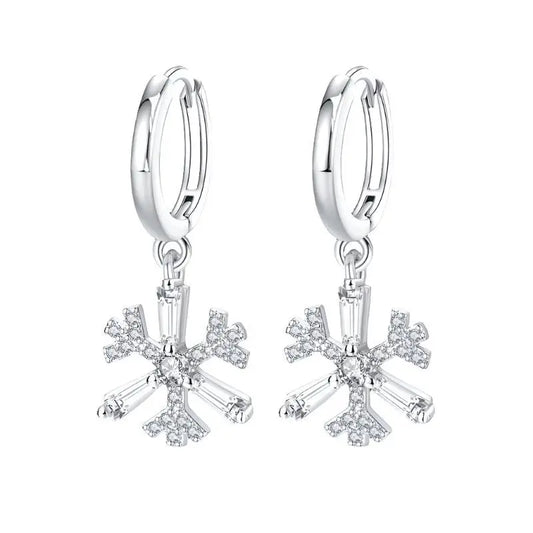Elegant silver flower drop earrings with clear crystals on a white background.