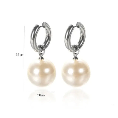 Classic Pearl Drop Earrings Silver Hoops - Classic pearl drop earrings with silver hoops on a white background.