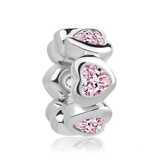 Sterling silver spacer charm with pink heart-shaped crystals.