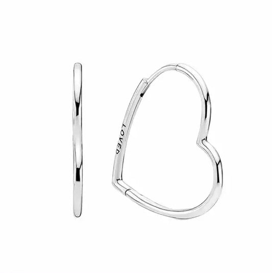 Unique heart-shaped silver hoop earrings on a white background.