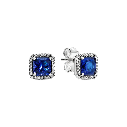 Elegant sapphire blue stud earrings with sterling silver setting and cubic zirconia halo.