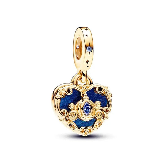 Gold heart-shaped pendant with blue accents on a white background