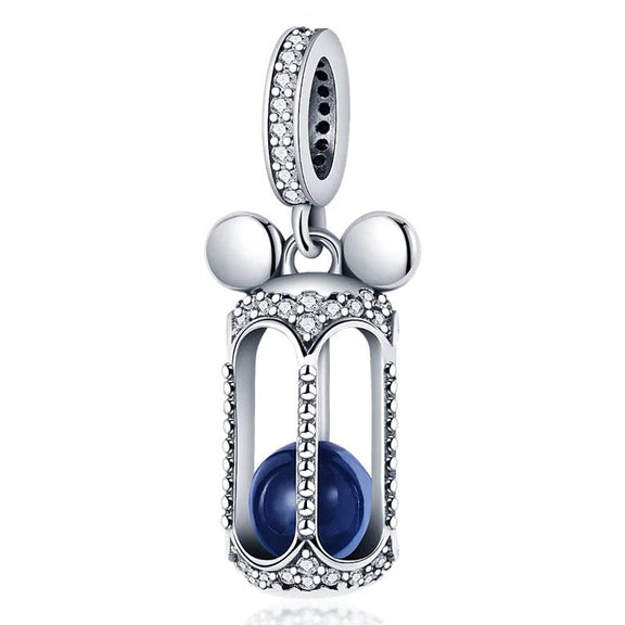 Elegant Silver Hourglass Charm with Blue Stone and Crystal Accents - Silver hourglass charm with crystal accents and blue stone.