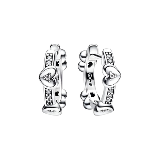 Sterling silver heart huggy hoop earbands with crystal accents, featuband an elegant.