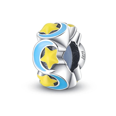 Celestial charm with yellow stars and blue crescent moons on a  sterling silver base.