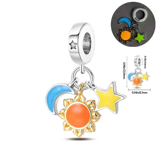 Sterling silver charm featuring sun, moon, and star with colorful enamel accents.