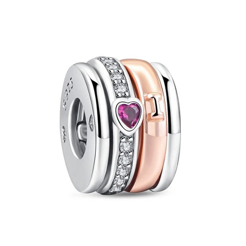 Shimmering Rose Gold Feather Charm with Crystal Line Detail - Rose Gold Feather Charm with line of crystal accents.