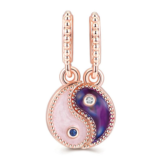 Rose gold yin-yang charm with crystals, showcasing the iconic symbol of harmony and balance.