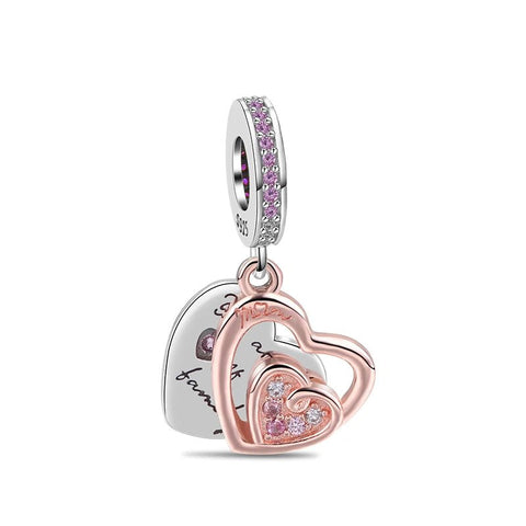 Rose gold engraved heart charm with intricate details and crystal accents, symbolizing family love.