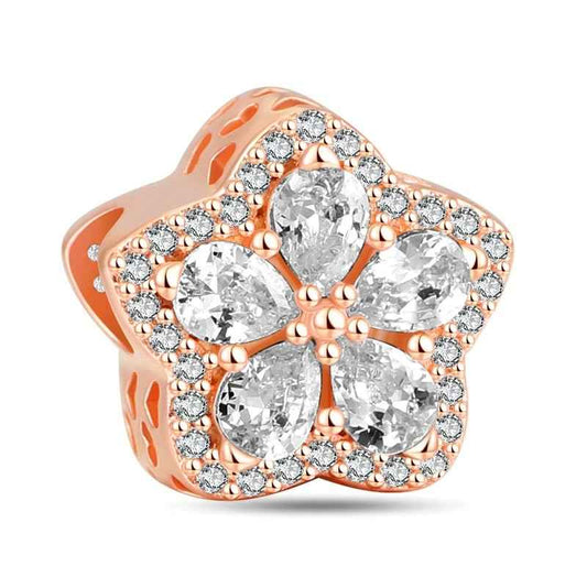 Rose gold starburst floral charm adorned with clear crystals, symbolizing new beginnings and growth