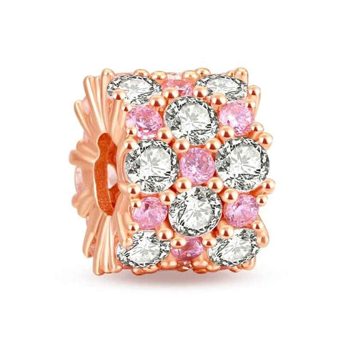 Rose gold charm with pink enamel, adding color to Pandora bracelet charms and collections.