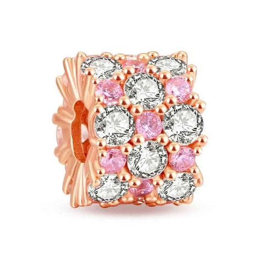 Rose gold charm with pink enamel, adding color to Pandora bracelet charms and collections.