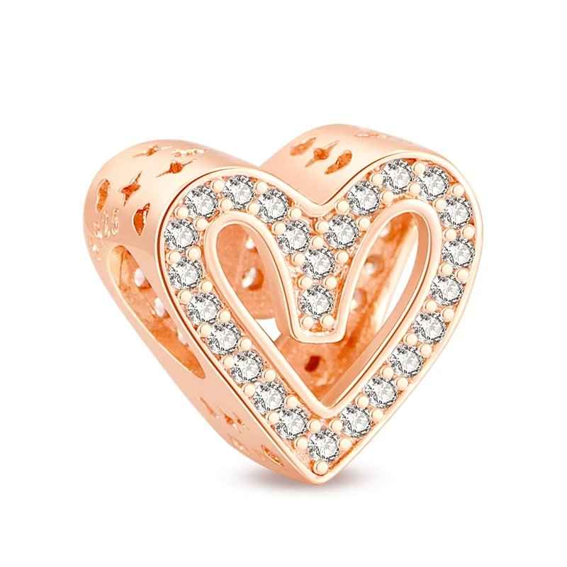 Rose gold heart charm with cubic zirconia, adding elegance to Pandora bracelets and charms.