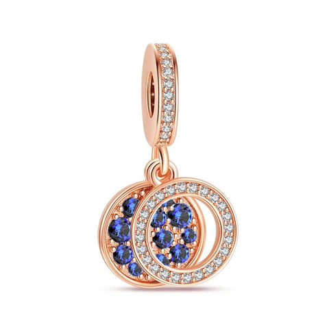 Blue Zirconia and White Stone Double Circle Rose Gold Charm - Rose gold double circle charm with zirconia, adding luxury to charm bracelets gold and Pandora.