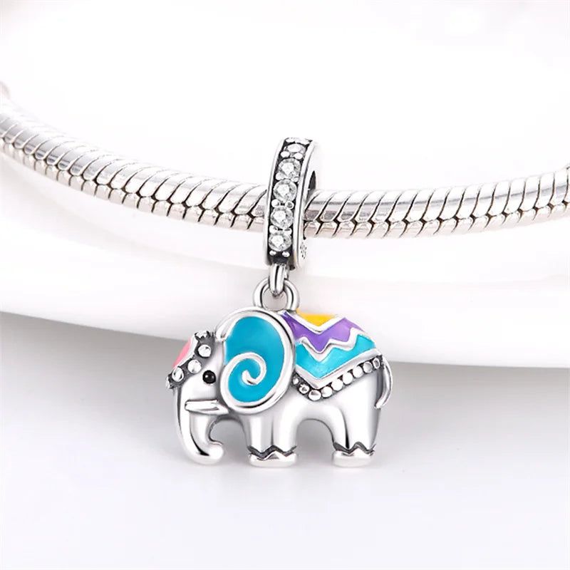 Sterling silver elephant charm with colorful enamel patterns, fits Pandora bracelets.