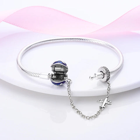 Pet-themed sterling silver bracelet with a dazzling paw print charm, great for animal lovers' jewelry collections.