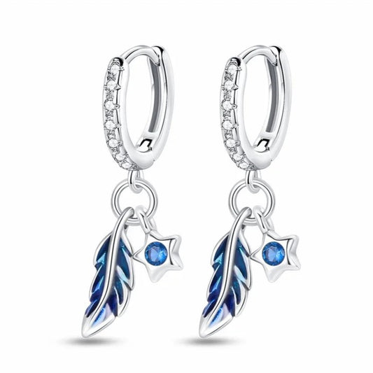 Blue feather and star dangle earrings in sterling silver.