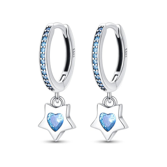 Sterling silver heart star drop earrings with blue accents on a white background.