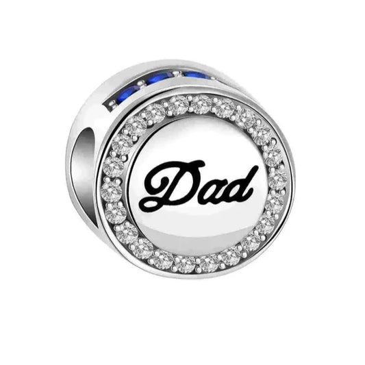 Sterling silver charm featuring the word "Dad" surrounded by sparkling crystals.