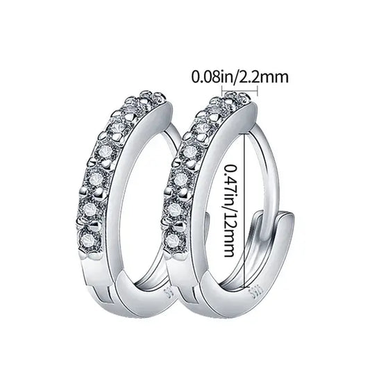 Sterling silver pave set hoop earrings with cubic zirconia stones.