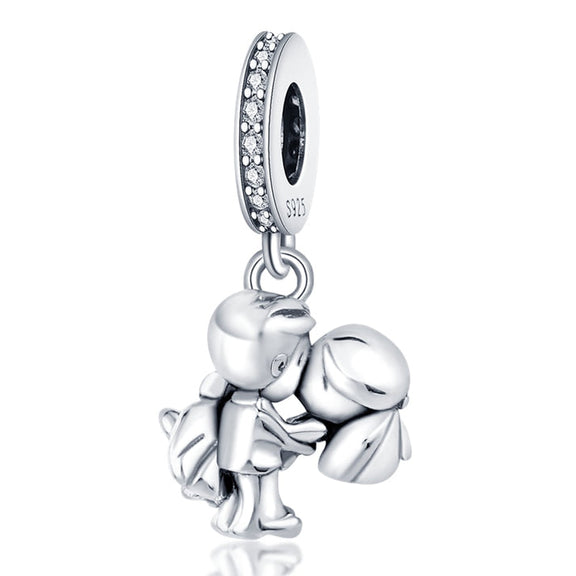 Enchanting Lovers Sterling Silver Charm with Sparkling Accents - Sterling silver charm featuband two lovers kissing with sparkling cubic zirconia accents on the.