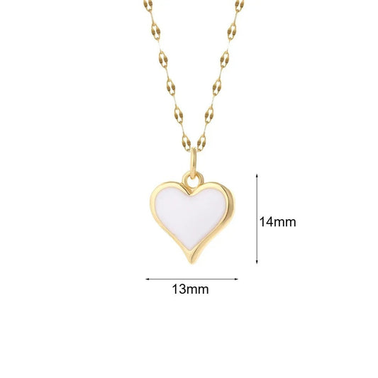 Gold-plated necklace with a white enamel heart pendant, measuring mm by mm, on a delicate chain.