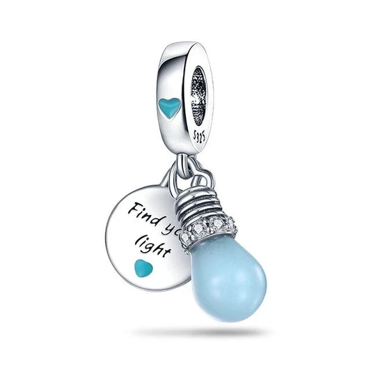 Sterling silver light bulb charm with blue enamel and motivational message "Find your light.