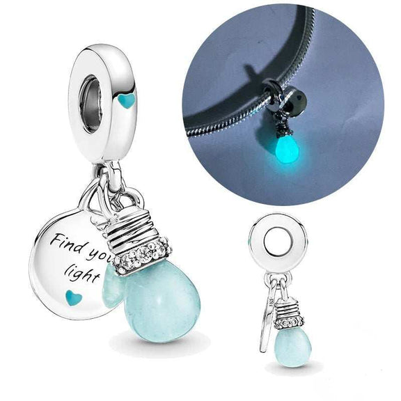 Glow In The Dark Light Bulb Dangle Charm - Sterling silver light bulb charm with blue enamel and motivational message "Find your light," perfect for inspiration and creativity to light your day