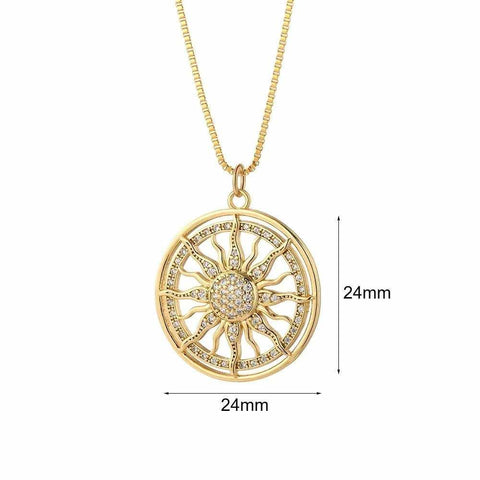 Radiant Gold Sunburst Pendant Necklace with Sparkling Crystal Inlays - Gold sunburst pendant necklace with crystal inlays, pendant measures mm in diameter.