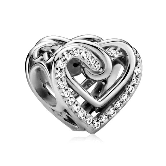 Interlocking Hearts Charm - Sterling silver charm with two interlocking hearts adorned with sparkling crystals.