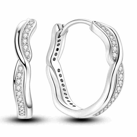 Stylish Sterling Silver Wavy Diamond Hoop Earrings - Sterling silver wavy hoop earrings with sparkling diamonds.