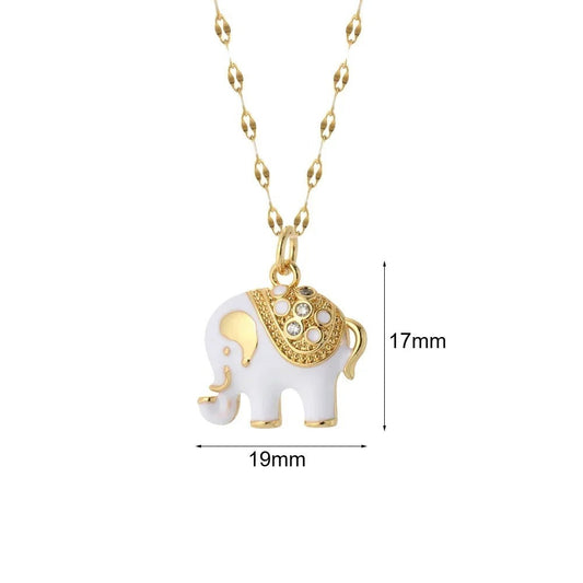 Gold-plated elephant pendant necklace with white enamel and crystal accents.