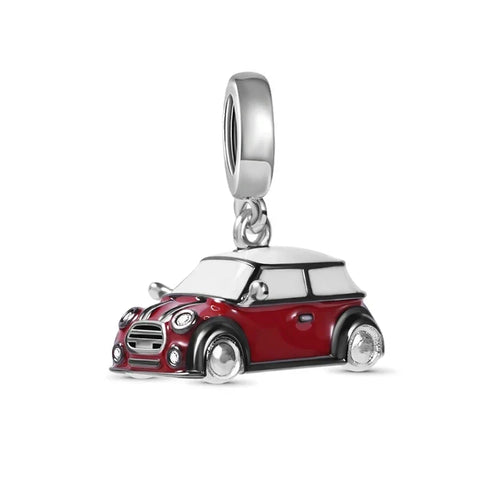 Red car charm on a white background