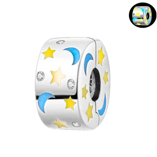 Sterling silver moon and stars charm with yellow stars and blue moons on enamel.