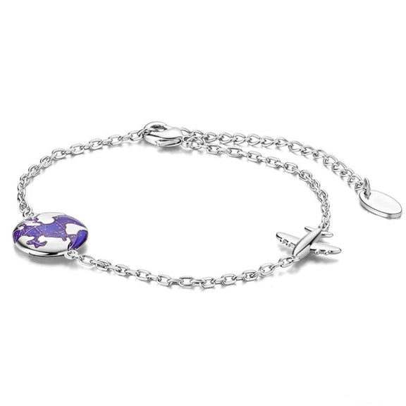 World Travel Charm Silver Bracelet with Purple Globe - Silver bracelet with a purple globe charm and a small airplane charm.