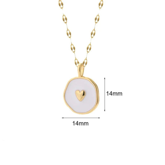 Gold-plated white heart pendant necklace with a mm diameter.