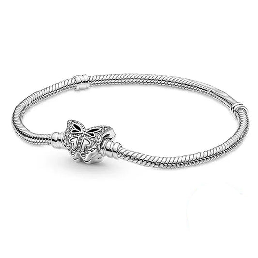 Sterling silver bracelet with a detailed butterfly charm, compatible with Pandora charms.