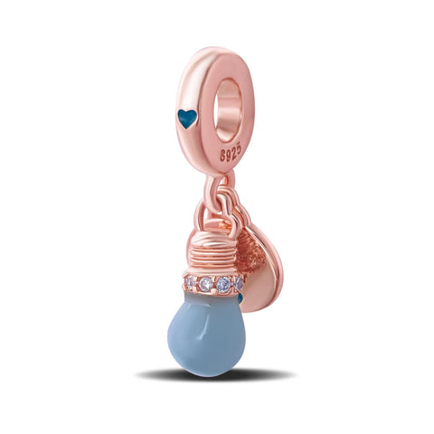 Rose gold lightbulb charm with blue enamel